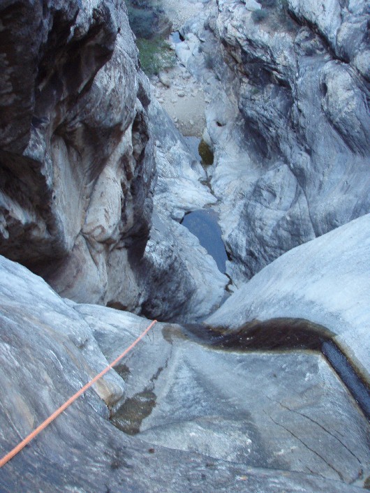 A look over the edge of the rap down the water fall.